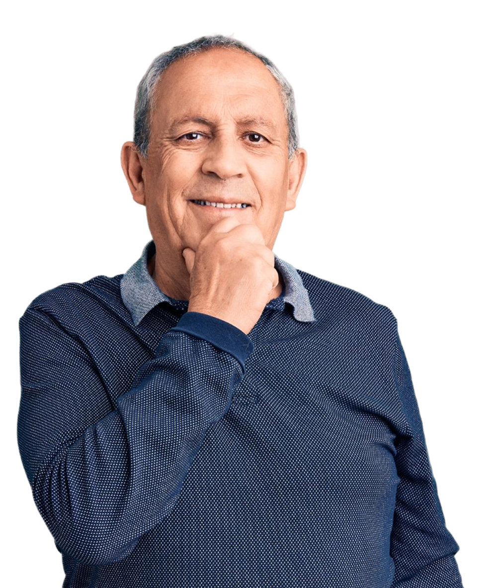 Man wearing a blue sweater with a grey background